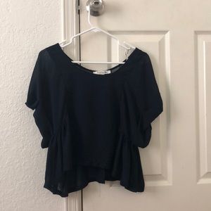 It is a Forever21 shirt, dark blue